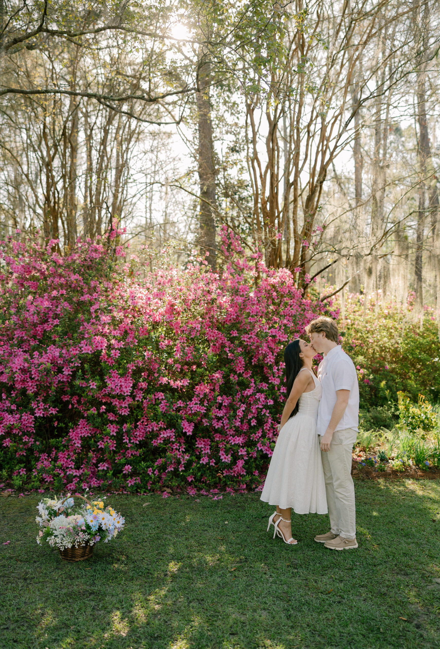 Engagement session under the oak trees at White Point Garden, Charleston